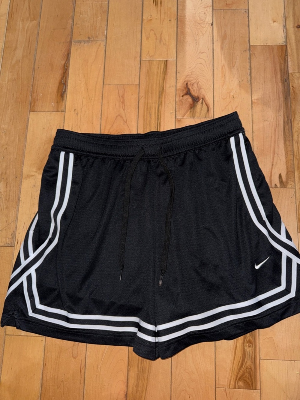 Nike Black Athletic Shorts with White Stripe Accents